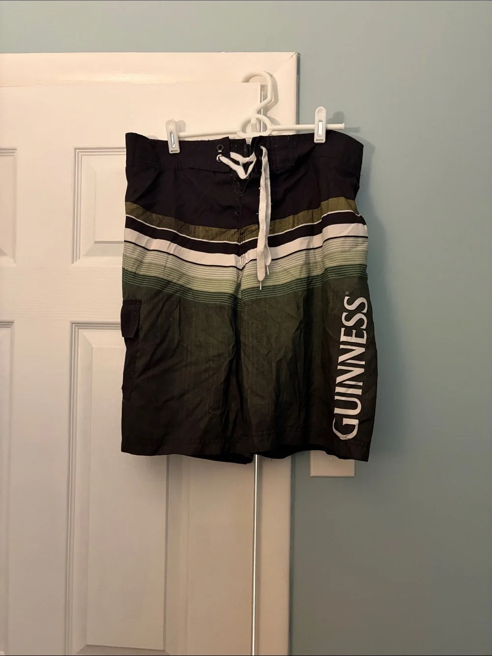 Guinness Black Swim Trunks with Green and White Stripes